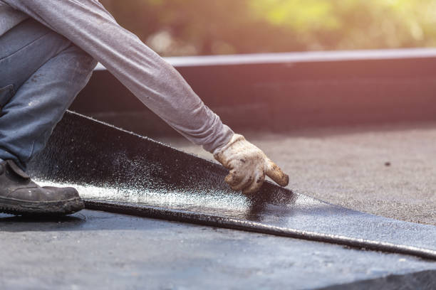 Professional Basement Waterproofing technician working in West Sayville, NY